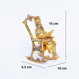 White Whale Chair Ganesha ji Reading Book with Antique Work,Ganesha Metal Statue,Ganpati Murti Idol for Pooja & Home,Office Décor Ganesh idol for Car Dashboard Religious Showpiece for Decoration & Gifting Article...