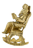 White Whale Brass Statue Hindu Art Ganesha God Seated On A Rocking Chair and Reading A Book 7 Inch